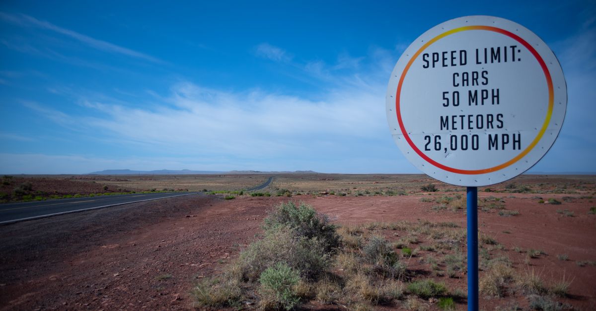 Funny speed limit sign in the Arizona desert, highlighting cars and meteor speeds.